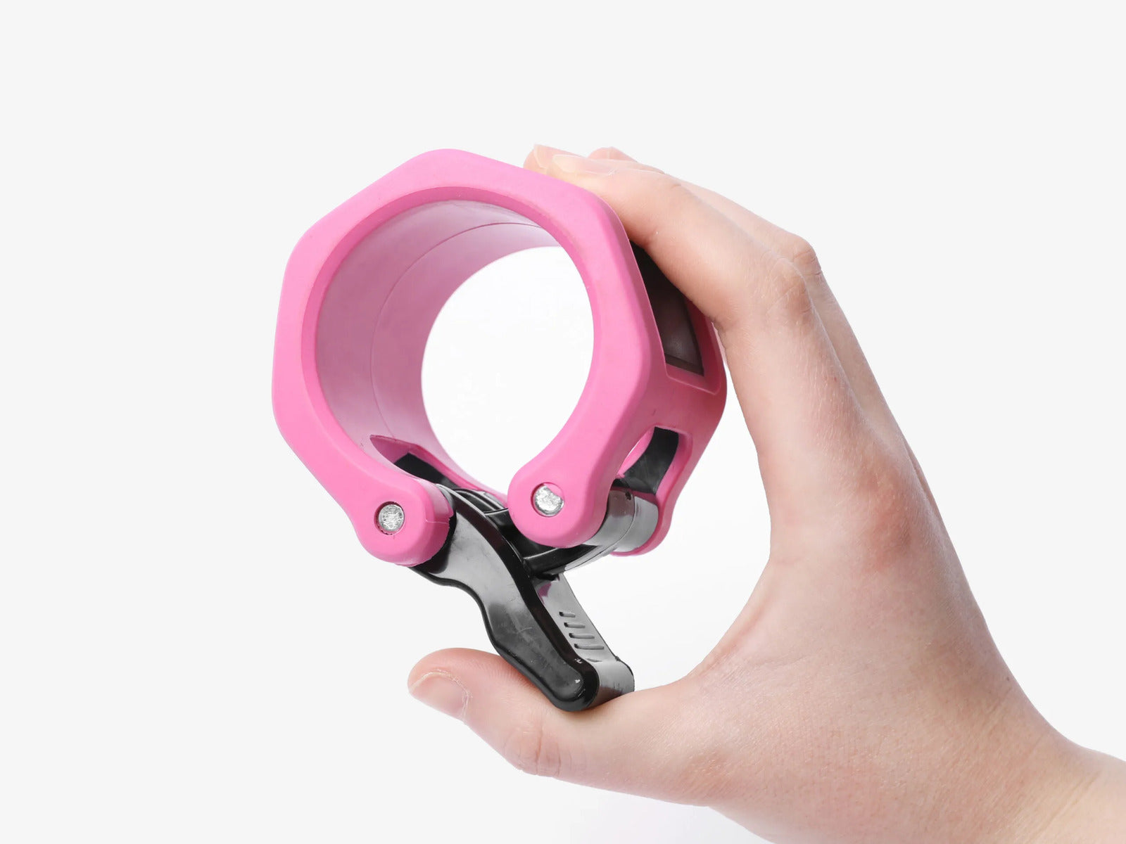 Hand Holding Pink Barbell Collar Demonstrating Compact And Lightweight Design