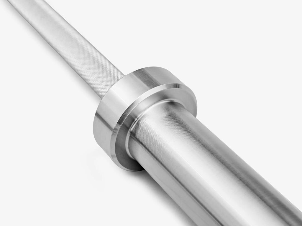 Close-up of the E1 Training Bar Women’s Hard Chrome sleeve and shaft showing smooth chrome finish and precision machining.