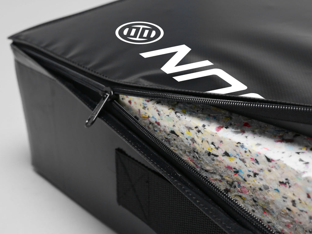 Interior view of the LUXIAOJUN shock absorption pad showing high-density compressed sponge cushioning