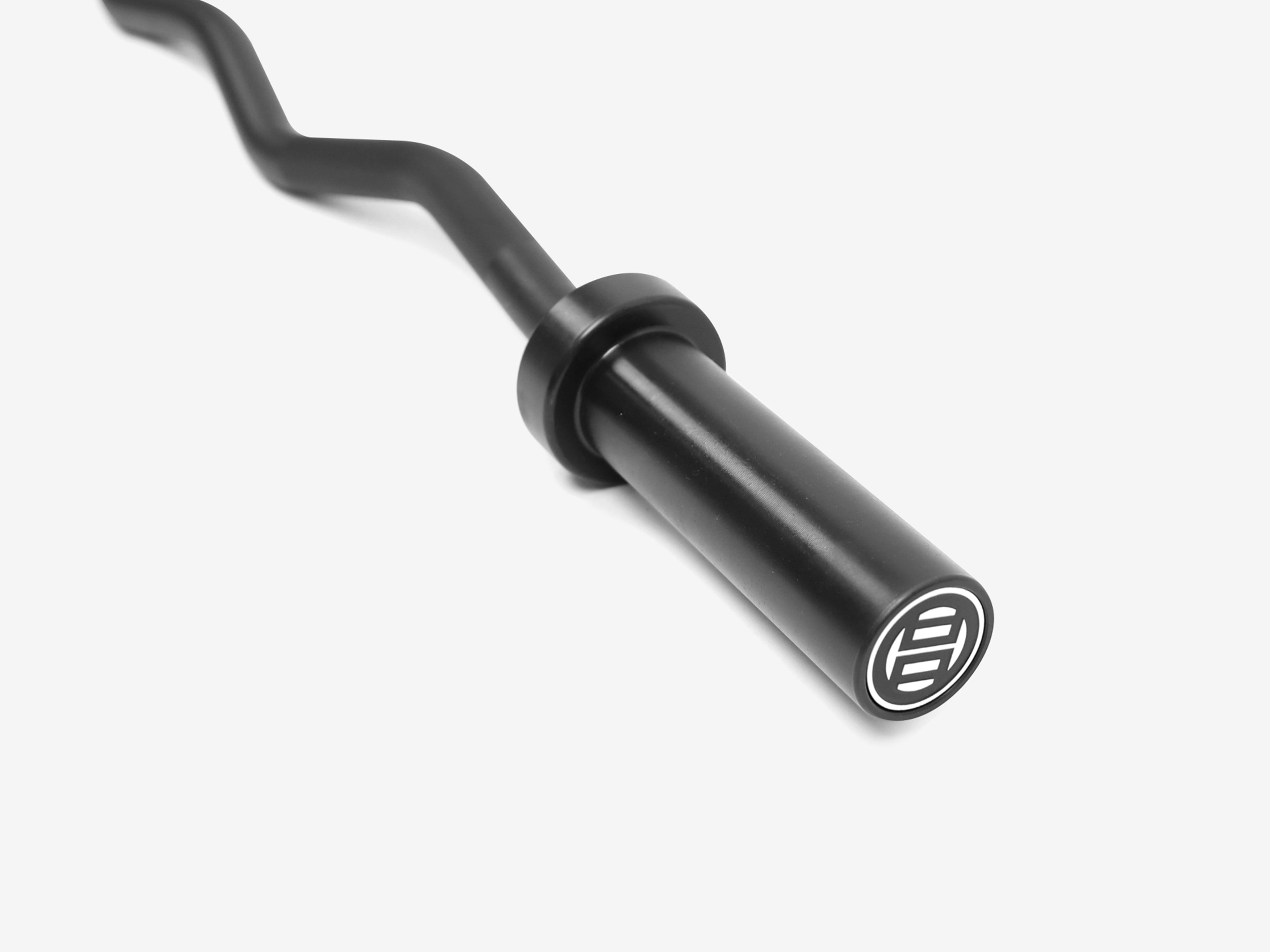 Close-up of LUXIAOJUN 1.2M Curl Bar Black sleeve end with logo cap