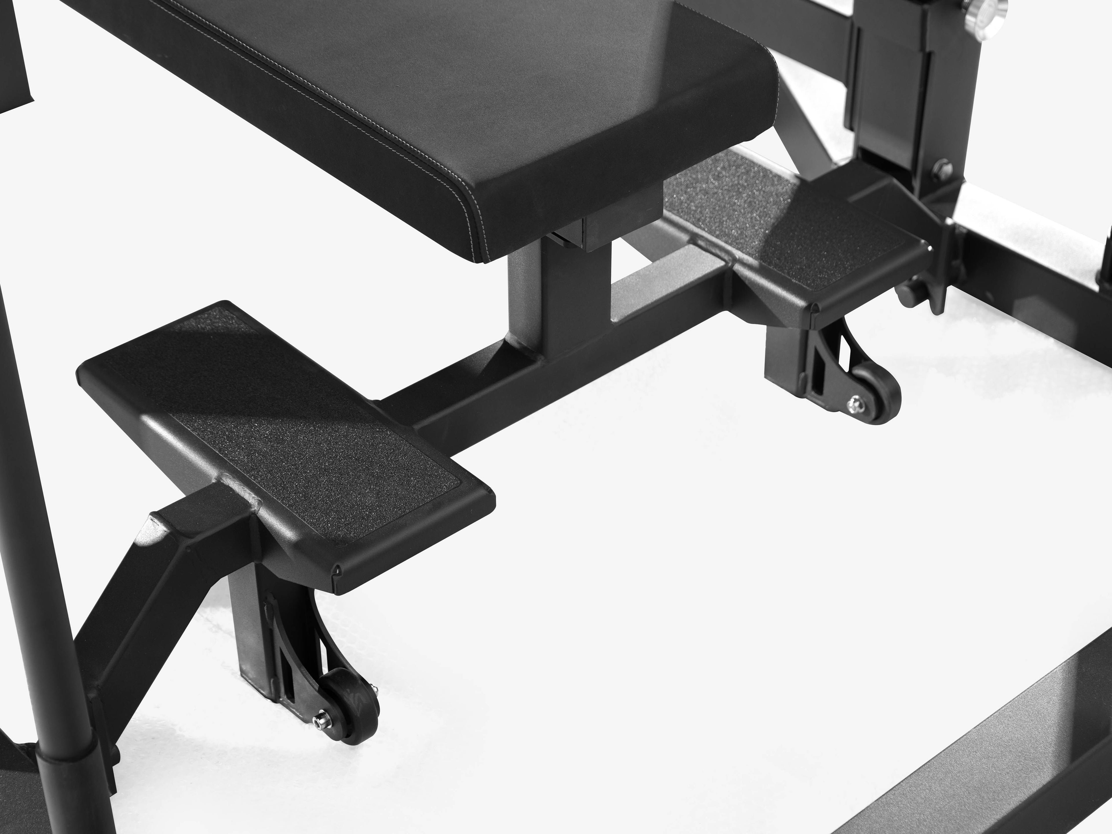 Close-up of detachable bench footplate and wheels on LUXIAOJUN Competition Power Rack