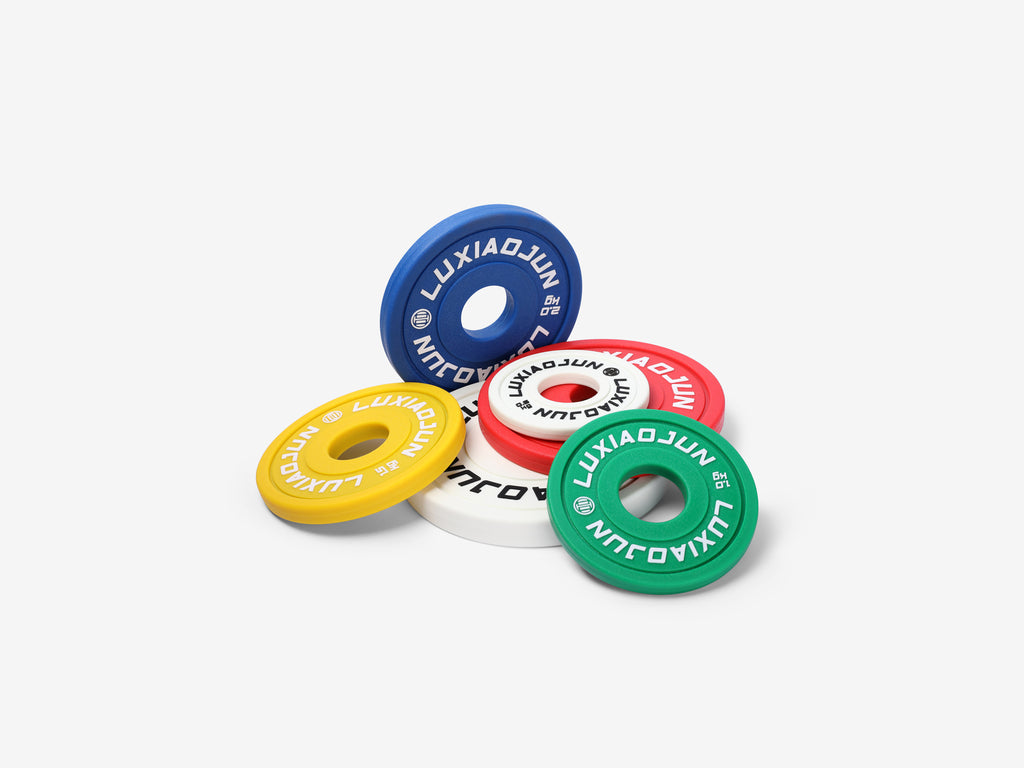 Angled group shot of LUXIAOJUN Urethane Change Plates 25KG Set in assorted colors