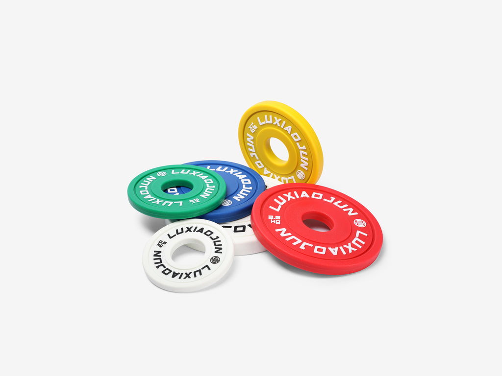 LUXIAOJUN Urethane Change Plates 25KG Set shown together in white, green, yellow, blue, and red