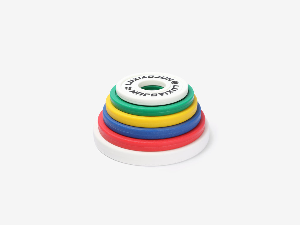 LUXIAOJUN Urethane Change Plates 25KG Set stacked in size order showing all colors